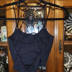 Nwot spider and webbed back swimsuit top rare size medium brand